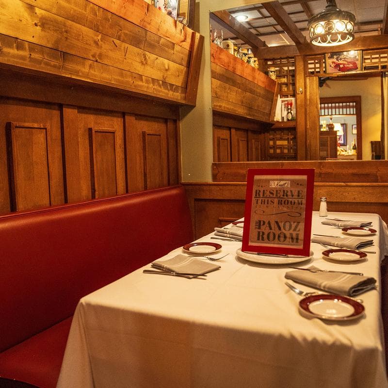 Warm wood booths in the main dining room